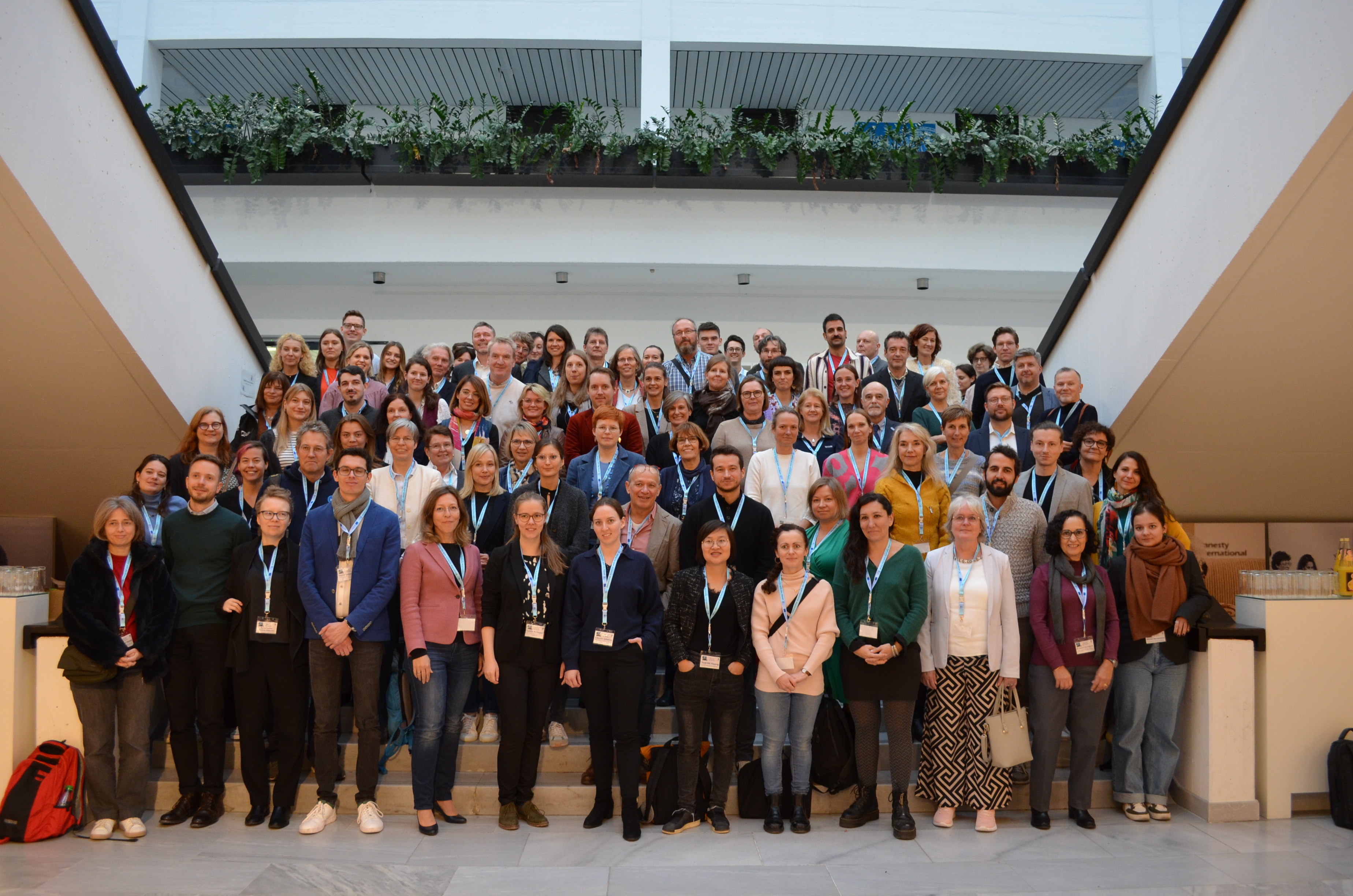 General picture of all the participants of the conference in the stairs of the venue